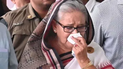 first legal action against hasina  former bangladesh pm  six others booked for murder of grocery owner