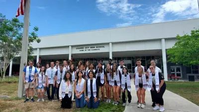 florida high school celebrates unique graduation with 14 twin pairs and one set of triplets