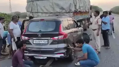 telangana  6 killed including infant as car rams parked truck on highway