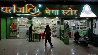 patanjali s  soan papdi  fails quality test  ramdev s company official and two others arrested