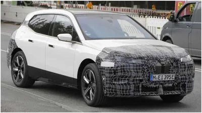 bmw ix facelift spotted during testing  launch anticipated in 2025