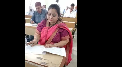 legal action taken  fir lodged against bihar teacher for marking papers without review