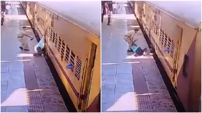 heroic rescue  gujarat constable saves passenger from falling under moving train