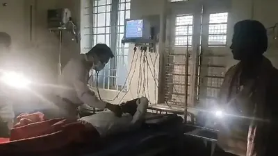 karnataka doctor relies on mobile torch to examine patient due to power cut