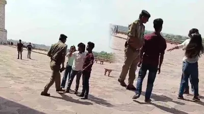 watch   cisf jawan pushes  slaps girl in taj mahal over making reels  then this happened