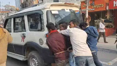 watch   4 accused push bihar police suv for over 500 mts after it ran out of fuel