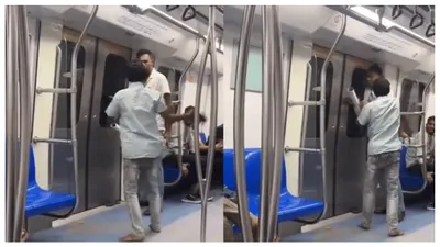 delhi metro video  man slaps passenger with slipper  incident sparks outrage