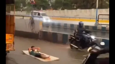 watch  pune resident s hilarious water surfing antics during rainstorm go viral  internet abuzz with laughter