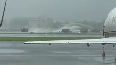 mumbai airport chaos  over 50 flights cancelled  operations resume amidst heavy rains