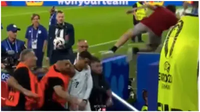 watch  cristiano ronaldo shocked by fan  narrowly escapes being kicked in the face