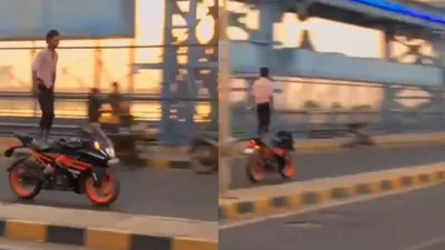 kanpur daredevil s  titanic  stunt on moving bike draws police attention