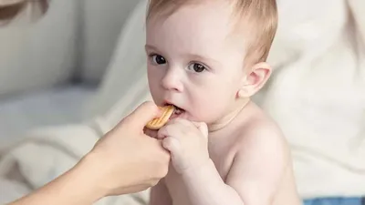 child eating cookies dipped in tea  read these health hazards