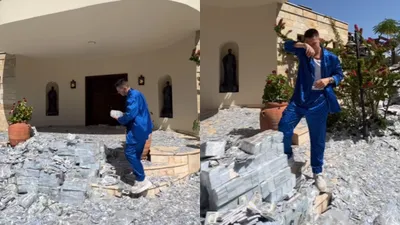 viral instagram video  man throws millions of dollars like trash from his home