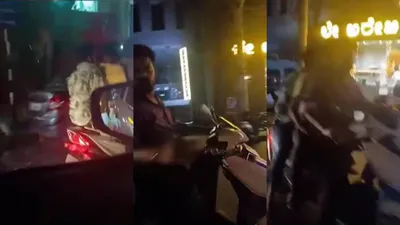 woman films 3 men chasing  banging on car windows in bengaluru road rage