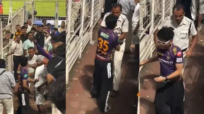 watch  police catch kkr fan red handed trying to steal match ball in pocket
