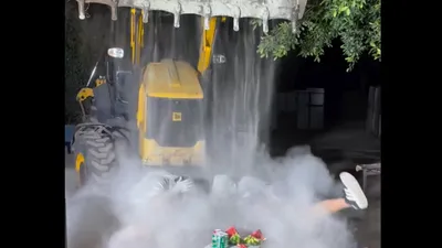 jcb machine turns peaceful picnic into dusty chaos  watch the video
