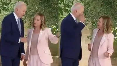 biden s awkward salute to meloni at g7 summit  goes viral