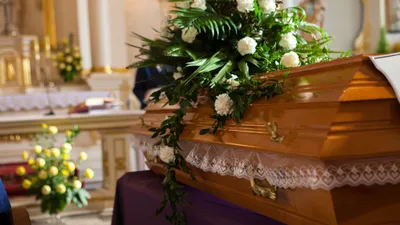 74 year old woman found breathing at funeral home after pronouncement of death