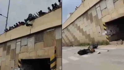 frustrated by stunt riders  people throw two scooters off bengaluru flyover