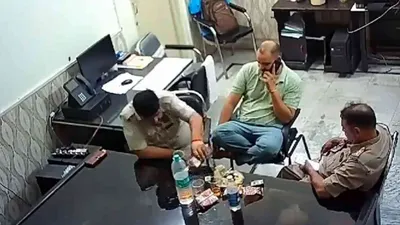 watch  uttar pradesh policemen caught drinking and partying in dial 112 office while on duty