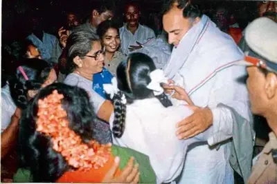part of body with gucci wrist watch  scattered shoes    scene just after blast when rajiv gandhi died