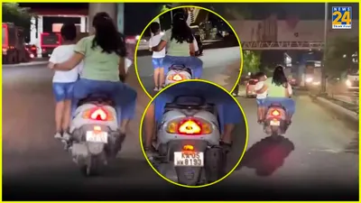 bengaluru  parents ride scooter with child standing on pillion footrest  video surfaces