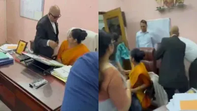 prayagraj  woman principal pulled from chair  forced out of office   watch